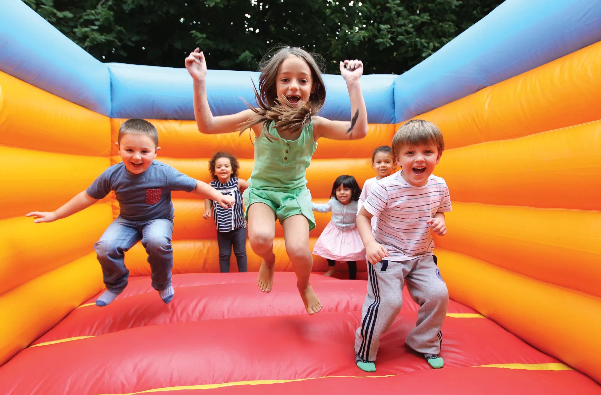 Jump on a bouncy castle and have fun